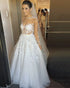 See Through O-Neck Wedding Dresses With Appliques Tulle Long Sleeves Sweep Train Bridal Gown